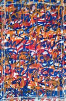 Close-up of painted surface showing layered spray paint and acrylic drips