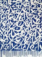 Close-up of white calligraphic graffiti script on blue canvas
