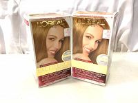 Front view of two boxes of L'Oreal Excellence Creme hair dye in shade D3 Dark Golden Blonde.