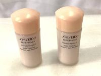 Front view of two small bottles with peach caps and product label on front for Shiseido Benefiance Wrinkle Resist 24 Night Emulsion 15ml each.