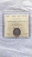 Front view of 1886 Canadian 10 cents silver coin in ICCS graded holder showing grade VF-30 and variety details