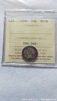 Front view of the 1888 Canadian 10 cent dime inside its ICCS graded holder showing VG-8 grade and certification number XNA 248.