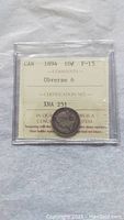 Front view showing the 1894 Canadian 10 cents silver coin graded F-15 with certification and Obverse 6 noted.