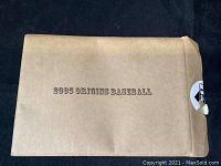 Cardboard envelope with text '2005 Origins Baseball' printed on front