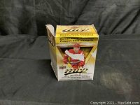 Front view of 2019-2020 Upper Deck collector series box featuring hockey player and bonus pack redemption information.