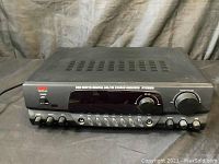 Front view of the Pyle PT260A stereo receiver powered off showing control knobs and headphone jack.