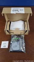 Seagate Barracuda 2TB hard drive in original packaging with box and manuals.
