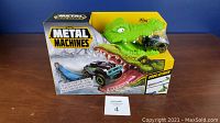 Front view of Zuru Metal Machines Croc Attack toy set in original packaging showing the metal truck and crocodile figure.