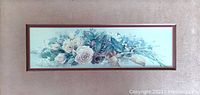 Full view of the framed floral print with a bouquet of roses in muted pastel colors.