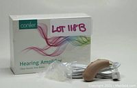 Photo shows Coniler Hearing Amplifier device in beige with white earpiece and cord, alongside original box labeled 'Hearing Amplifier Clear Sound, Hear Better'.