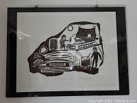 Full front view of framed black and white lithograph showing Inuit camp scene