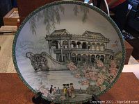 Front view of the plate showing Marble Ship structure, cherry blossoms, and figures