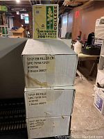 Boxes of Earthbound filler paper packs, showing quantity and UPC labels