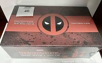 Front view of the sealed Deadpool Merc with a Mouth collectibles box showing logo and branding.