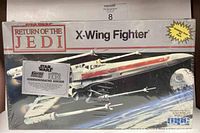 Front view of the sealed Star Wars Return of the Jedi X-Wing Fighter model kit box showing artwork and branding.