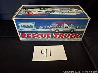 Original box of Hess Rescue Truck toy showing branding and features on side panel