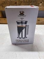 Front view of the white box packaging showing the French Press coffee maker image and brand logo.