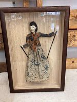 Frontal view of the kabuki-style marionette doll inside the shadowbox showcasing the detailed fabric dress and wooden face.