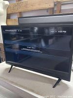 Vizio 24-inch TV powered on displaying no signal message on HDMI input.