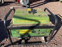 Front and top view of green Buffalo Tools Sportsman Series generator featuring 2000 surge watts and 1500 running watts, 2.8 HP engine