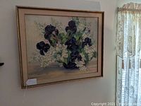 Framed oil painting on canvas showing whole floral still life with purple irises and white flowers in vase.