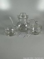Full set of Princess House clear glass teapot with lid, creamer, and sugar bowl with lid