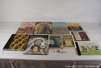 Full view of ten Native American themed books laid out on a table.