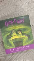 Front cover of the audiobook box set showing Harry Potter and Dumbledore illustration and title.