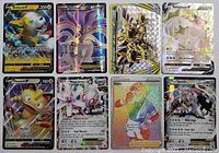Photo showing 8 Pokemon foil insert cards laid out side by side with detailed artwork visible including Boltund V, Malamar EX, Hydreigon BREAK, Rillaboom V, Meowth V, Magearna, Kabu Trainer, and Steelix V.