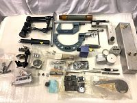 Full overview of all lot items laid out on white background