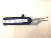 Top view of blue Mitutoyo Digitest 209-828 Digimatic Caliper Gage showing the body, dual metal measuring jaws, and push button dial.