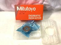 Mitutoyo Digimatic Indicator in original box with sealed anti-static packaging and plastic insert.