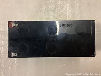 Top view of battery showing black casing with label '3101825'