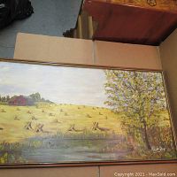 Framed oil painting on Masonite depicting rural landscape with barn, field, tree, and water body.