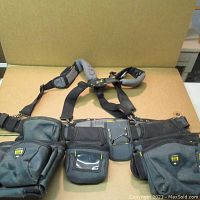 Full view of the Tool Rider GSR tool belt with harness showing various pouches and adjustable straps.
