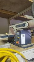 Front view of Mastercraft belt and disc sander showing front power switch, disc sander, and table