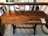 View of the tabletop demonstrating shape, dimensions, and finish.