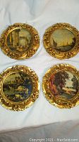 Four circular Italian art rondelles with various painted scenes in gold ornate frames