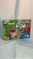 Front of the Lego Duplo 10893 box showing Spiderman and Electro characters, labeled 'Super Hero' and indicating 29 pieces for ages 2+
