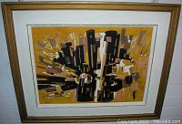 Full frontal view of framed abstract painting