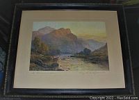 Framed art print showing full view of the artwork "Perthshire River" by A. De Breanski in black wooden frame and beige matting.