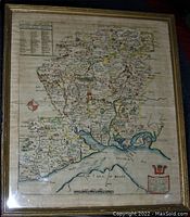 Framed hand-coloured antique map of Hampshire, showing overall condition and framing