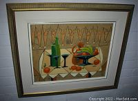 Full view of framed painting hanging against brick wall