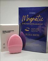 Photo of HSBC Magnetic Eyeliner & Eyelashes Kit box and pink facial cleansing instrument box