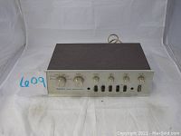 Front view of preamplifier on white backdrop showing control panel