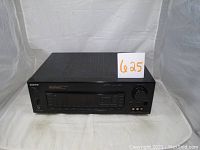 Front view of the Sony STR-D915 Audio/Video Control Center showing the full front panel including power switch, volume knob, input selection buttons and audio jacks.