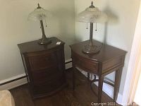 Overview of both mahogany-finish tables with matching lamps