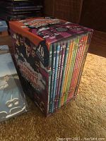 Complete Monty Python's Flying Circus 16 DVD set in original slipcase showing colorful spines and artwork