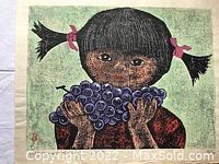 Full view of the woodblock print showing young girl with pigtails holding grapes with signature and numbering visible
