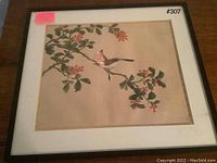 Front of framed Japanese hand painted bird and flower print showing the artwork detail and frame.